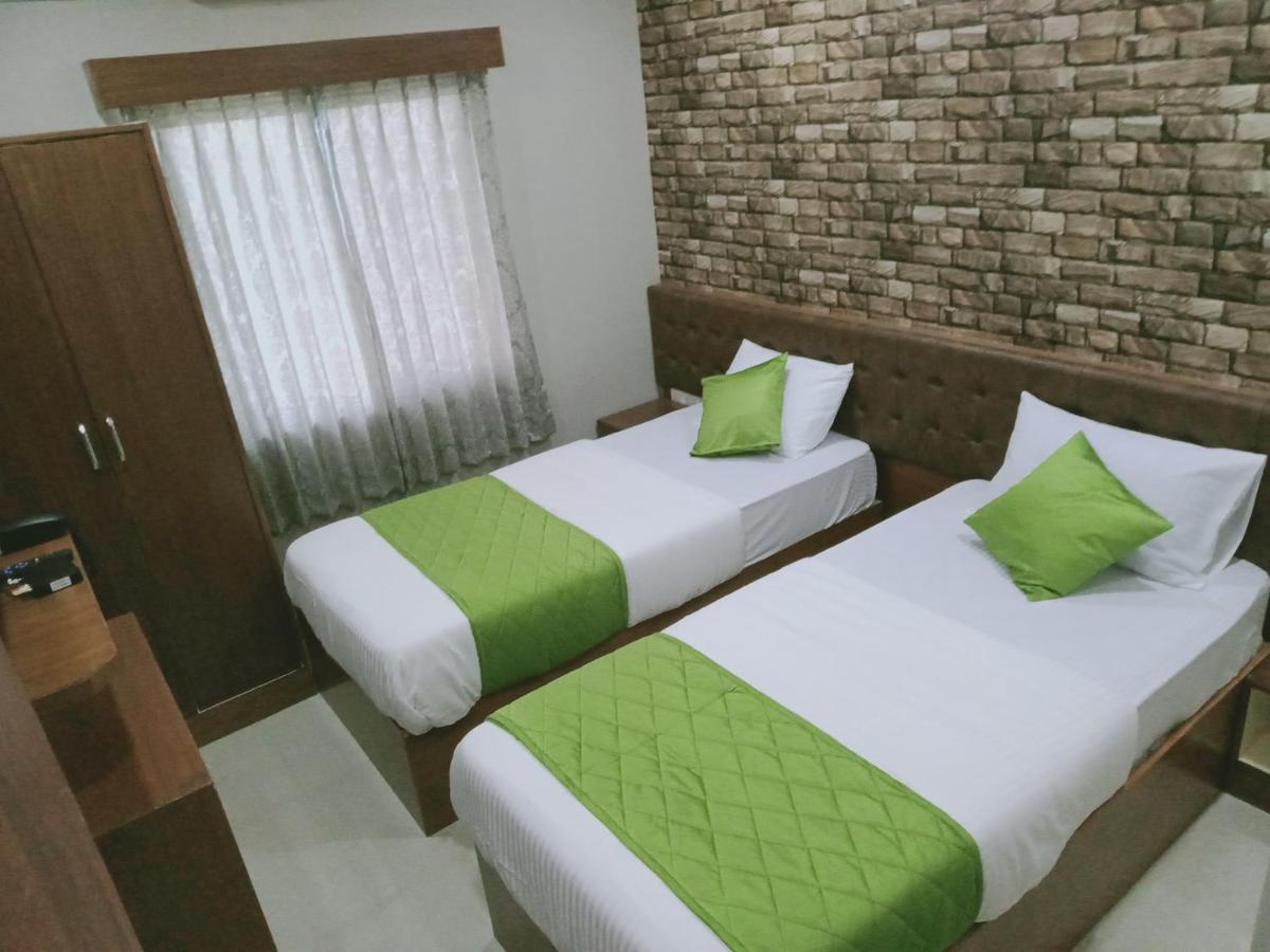 Olivia Inn And Suites Bangalore Exterior photo