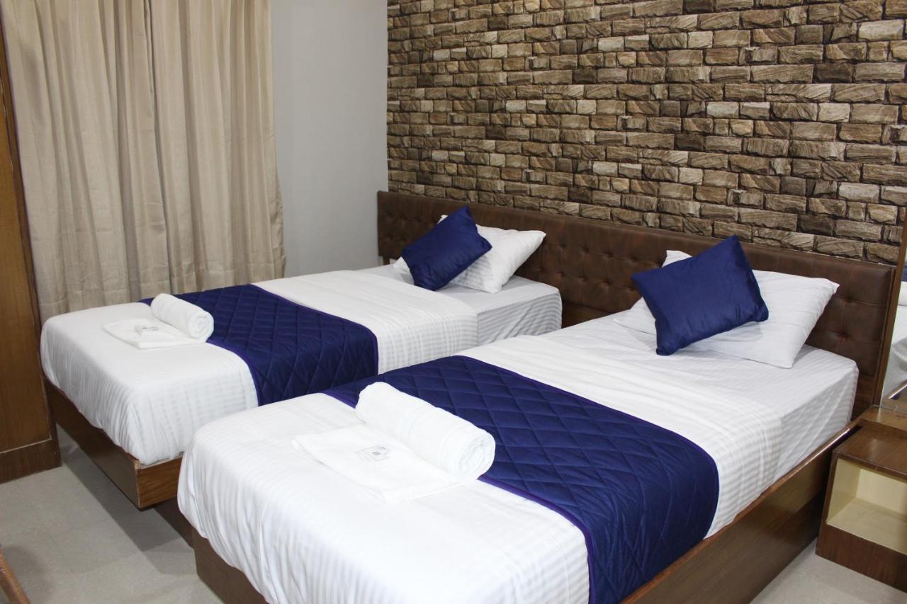 Olivia Inn And Suites Bangalore Exterior photo